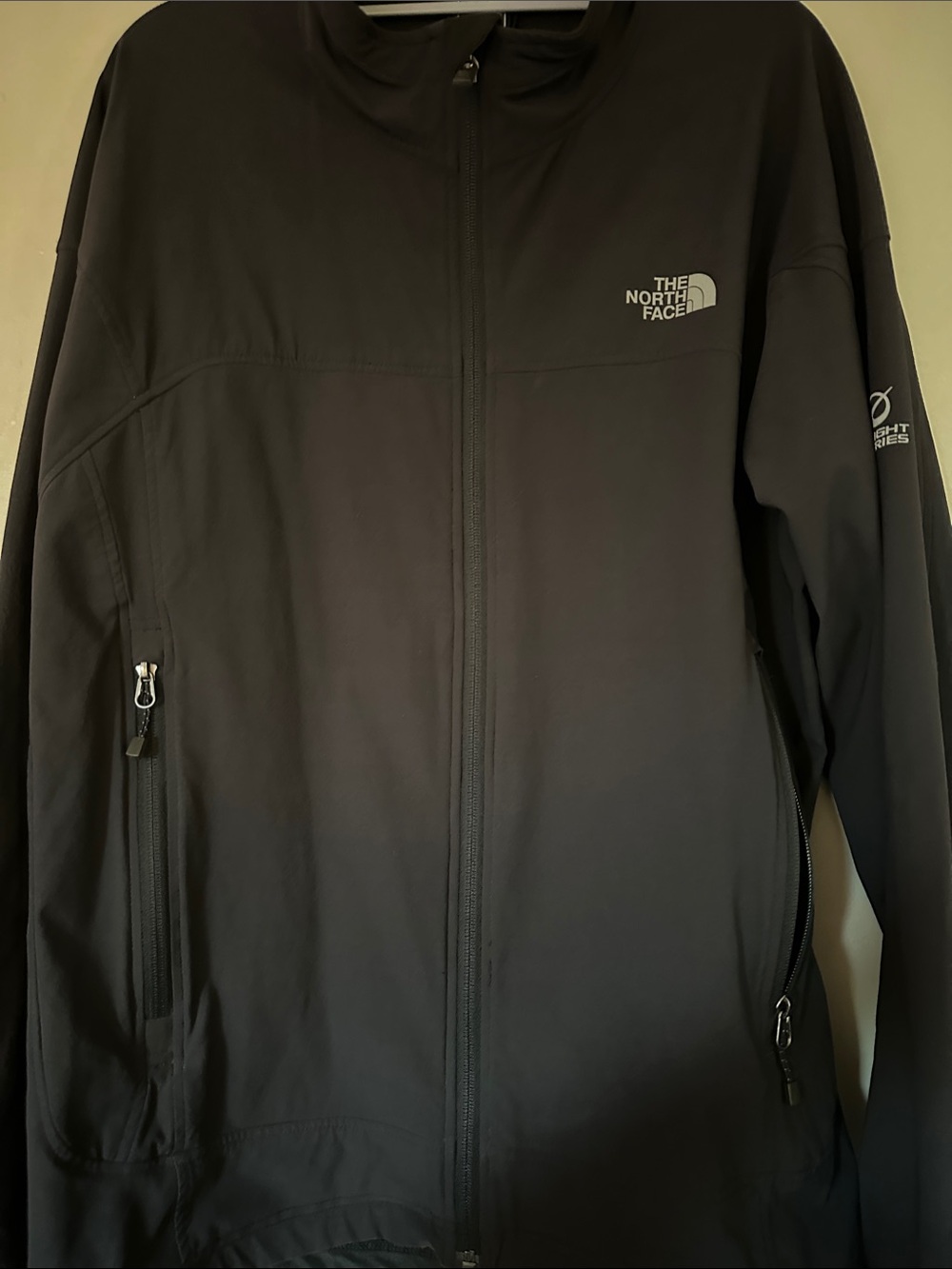 The North Face Black Windbreaker Jacket with Zip Pockets